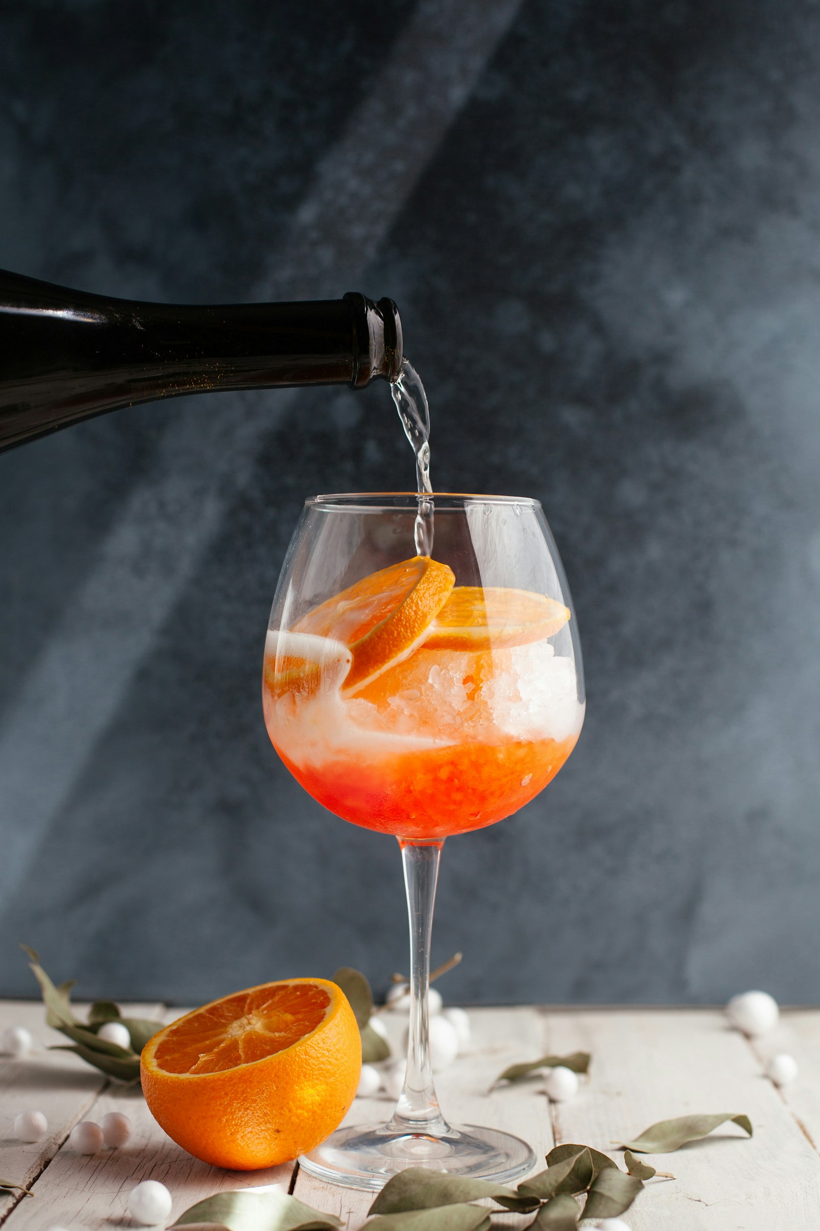 Refresco High Soda servido con naranja fresca